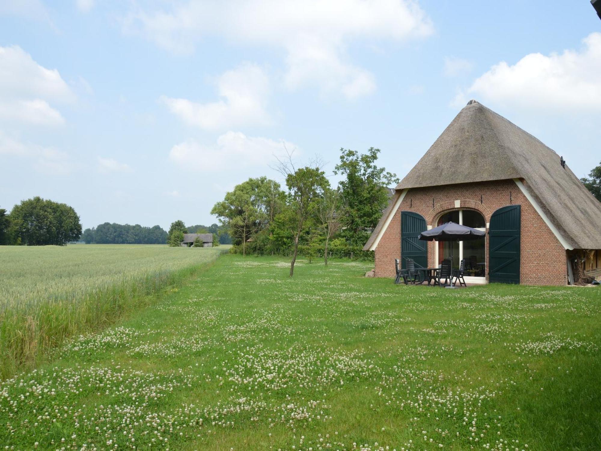 Quaint Farmhouse In Geesteren With Meadow View Exterior photo